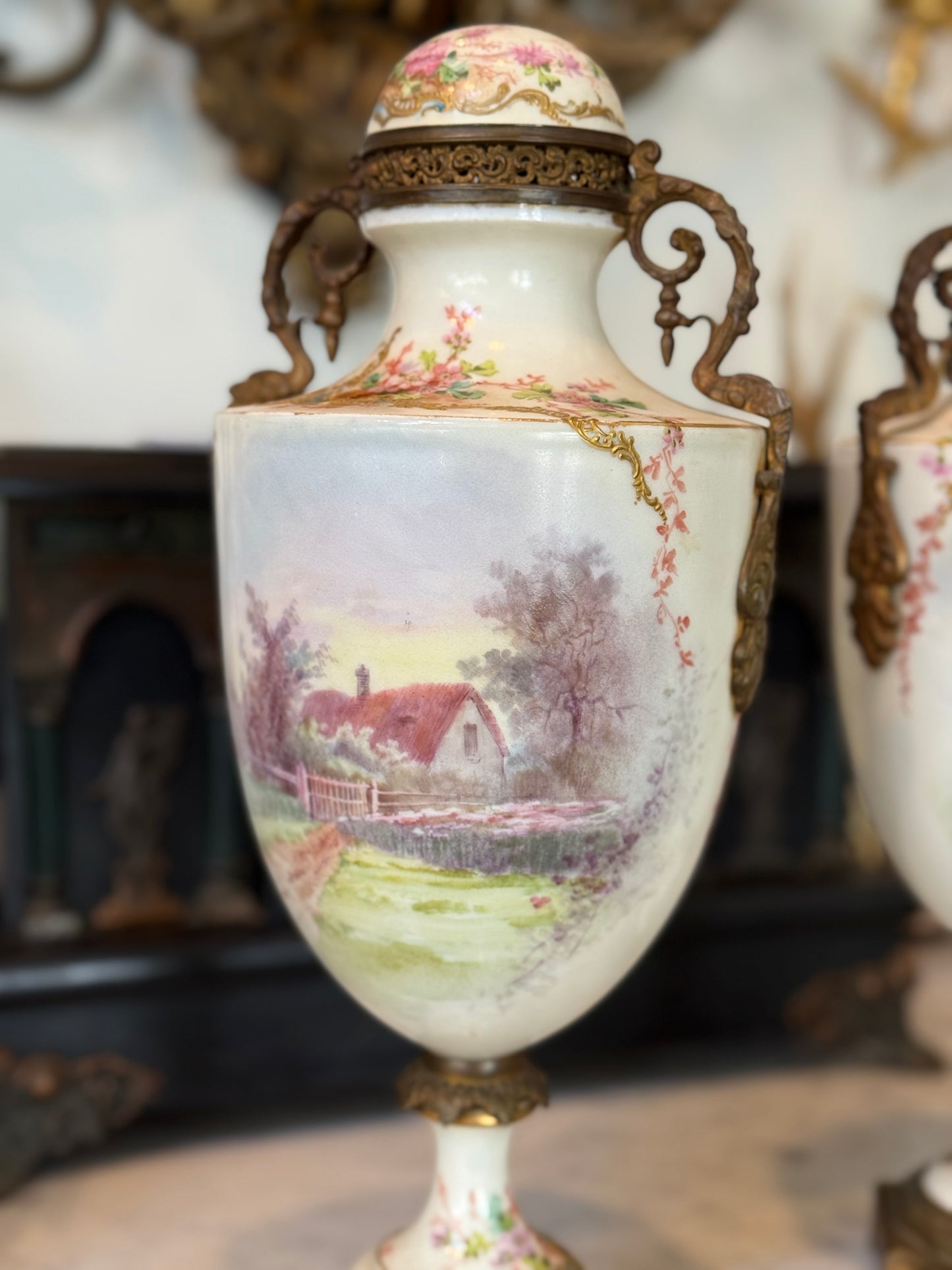 Pair of Antique Hand-Painted Sèvres-Style Porcelain Lidded Urns with Ormolu Mounts