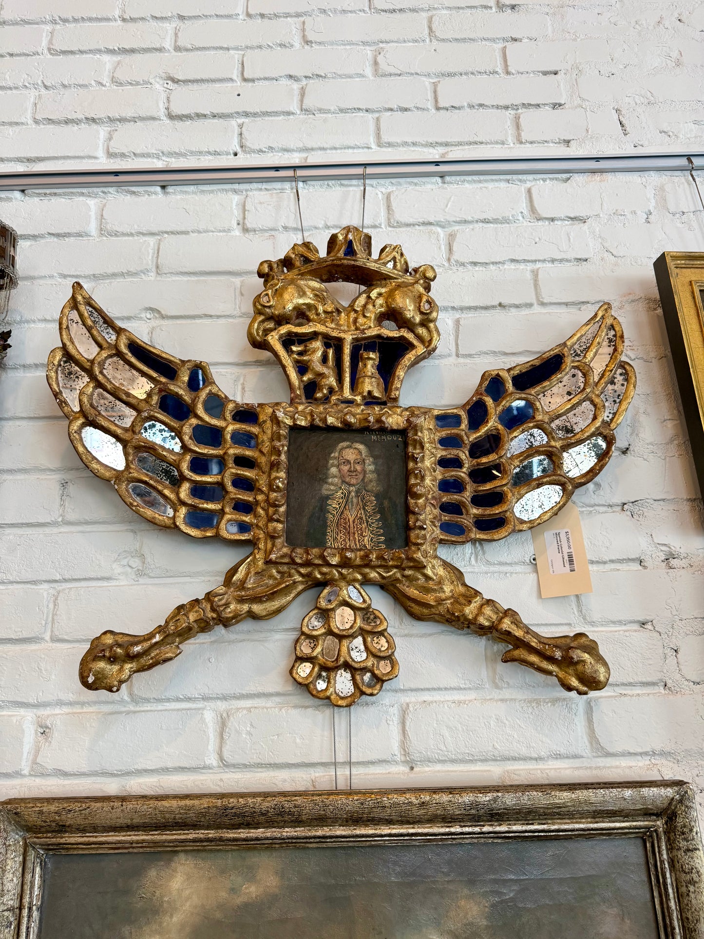 Spanish Colonial Giltwood Heraldic Mirror Frame with Portrait, Late 18th/Early 19th Century