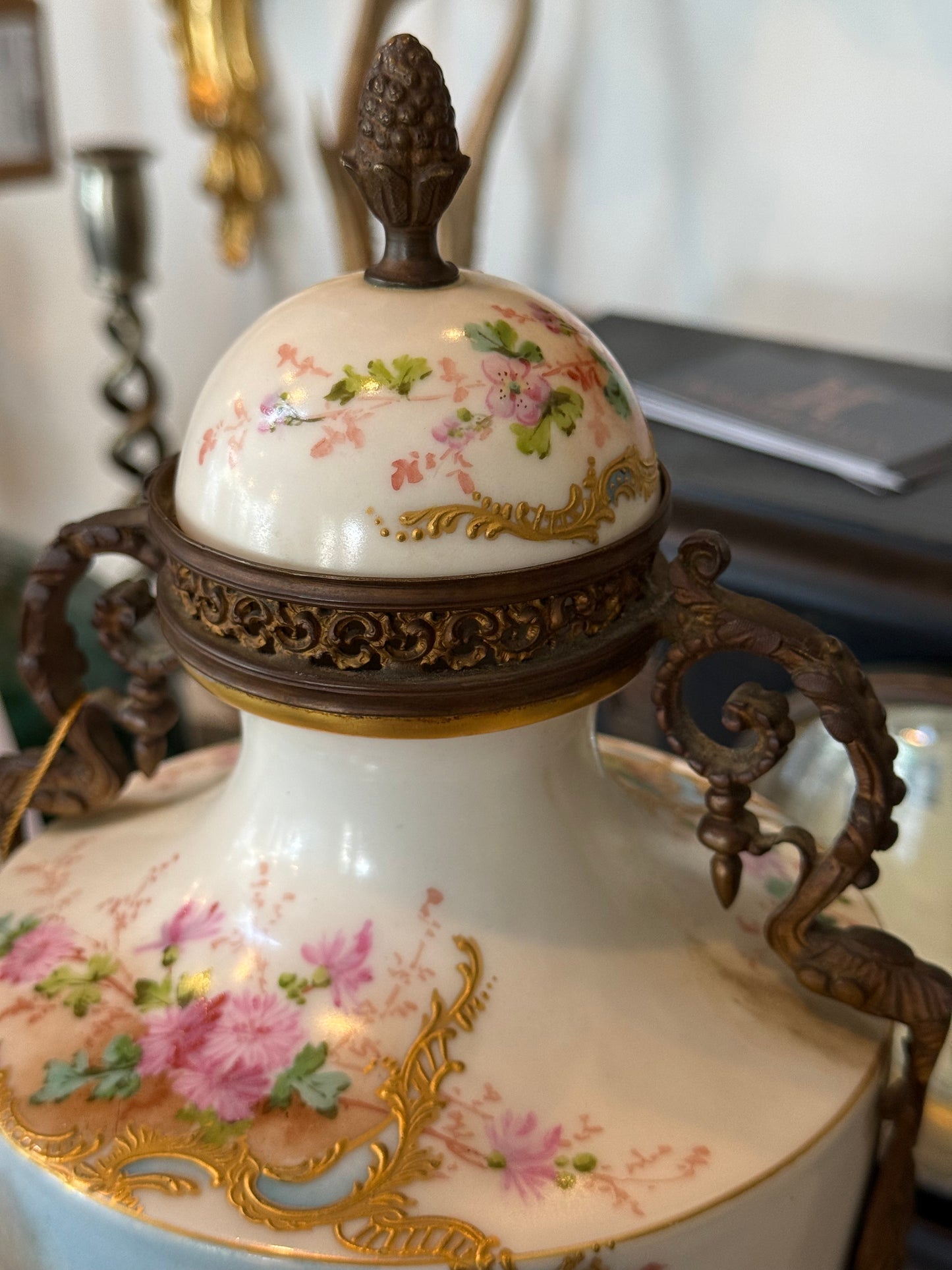 Pair of Antique Hand-Painted Sèvres-Style Porcelain Lidded Urns with Ormolu Mounts