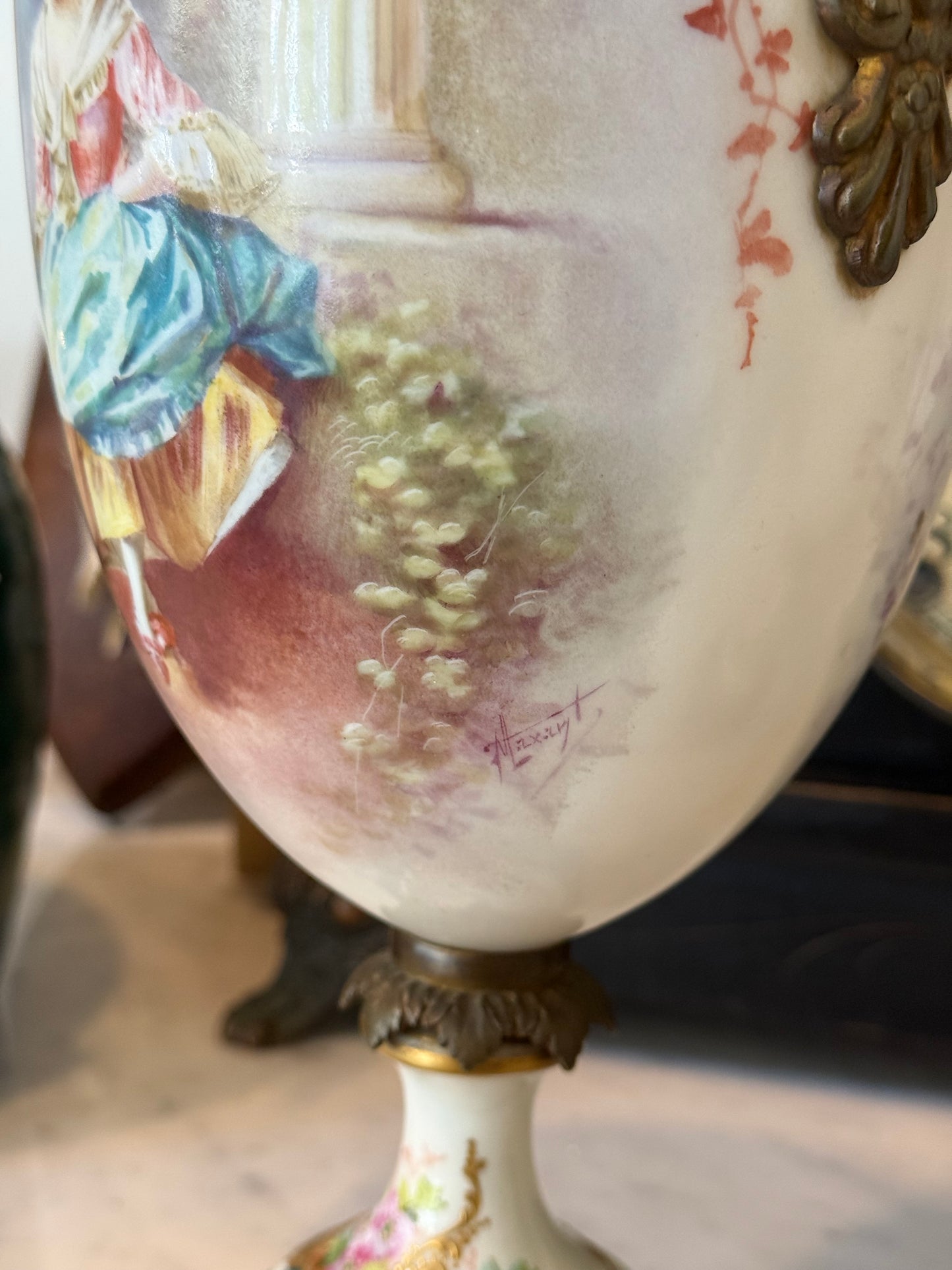 Pair of Antique Hand-Painted Sèvres-Style Porcelain Lidded Urns with Ormolu Mounts